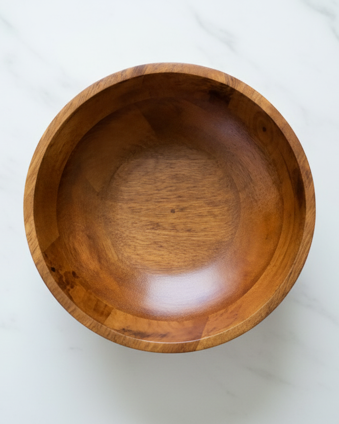 Wooden bowl on a white background